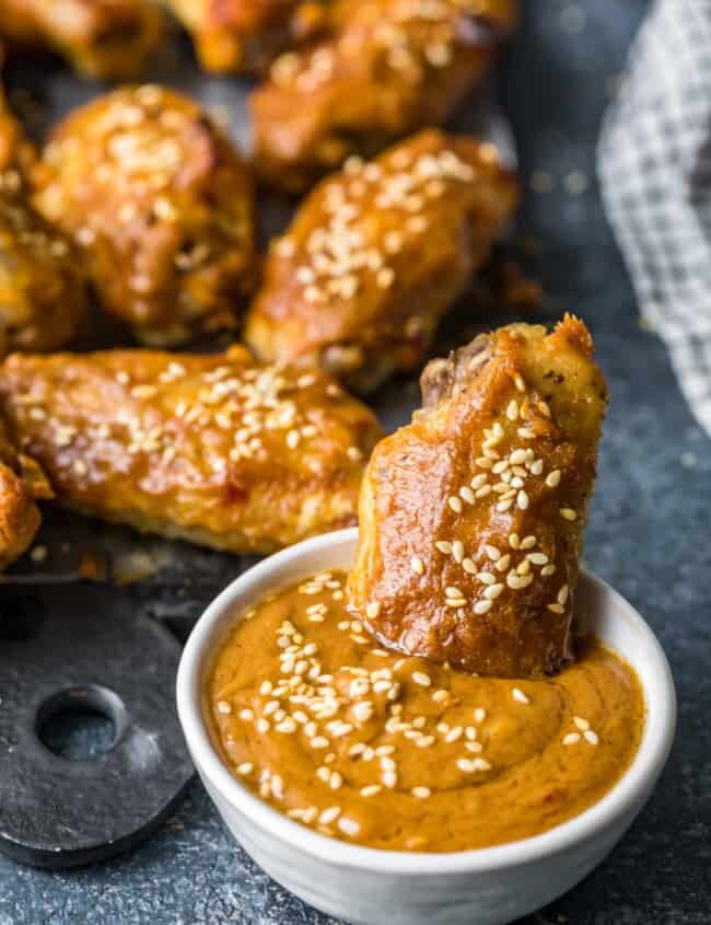 chicken wing dipped in peanut sauce