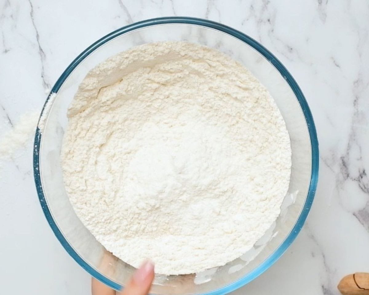 Dry ingredients in a glass bowl.