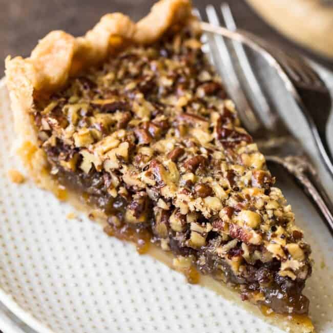 pecan pie slice on a white plate
