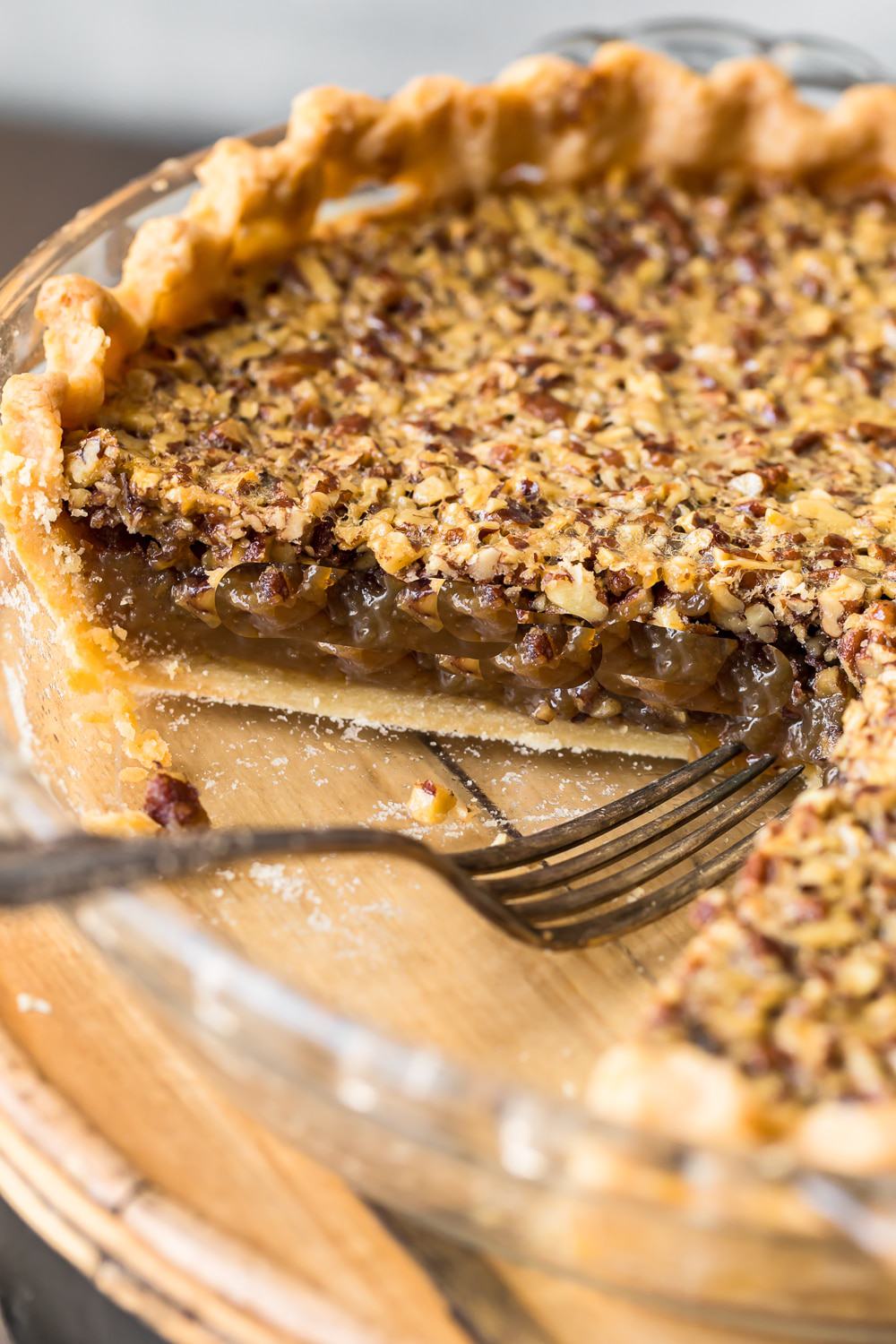A fork next to the pecan pie