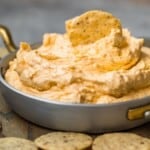 beer cheese dip in a pan with chips