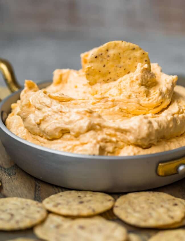 beer cheese dip in a pan with chips