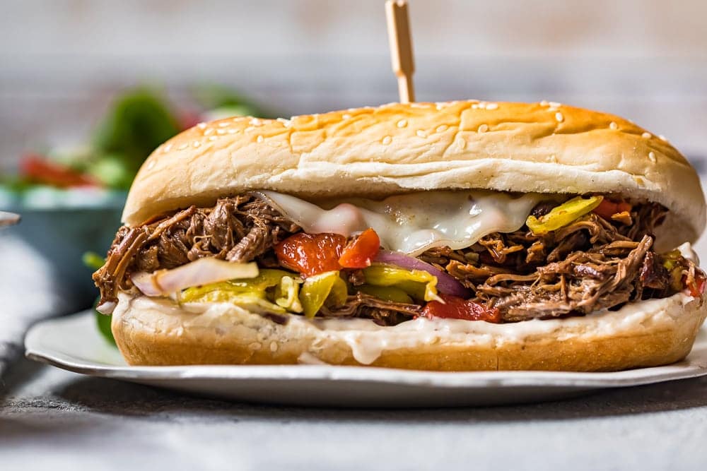 view of italian beef and bun on plate