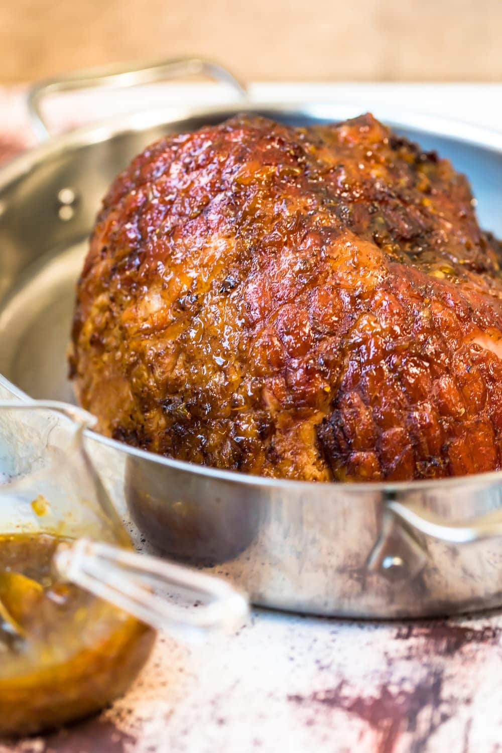 A ham in a roasting tin before being sliced