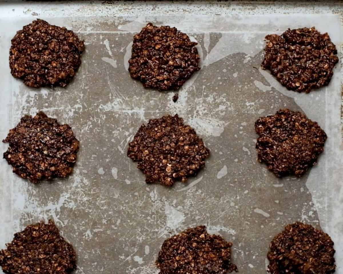 Cookies on a parchment lined baking sheet.