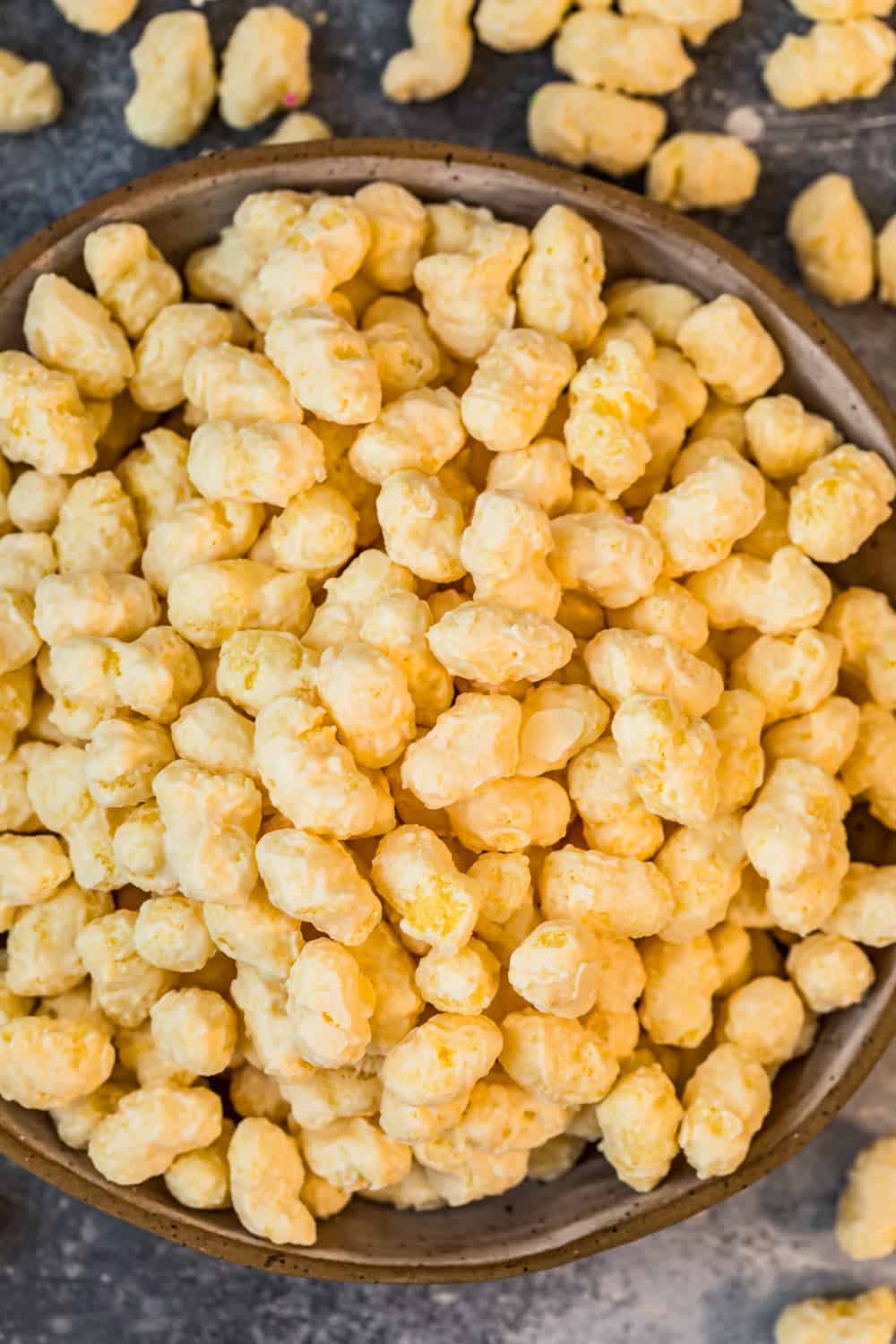 corn puffs in brown bowl 