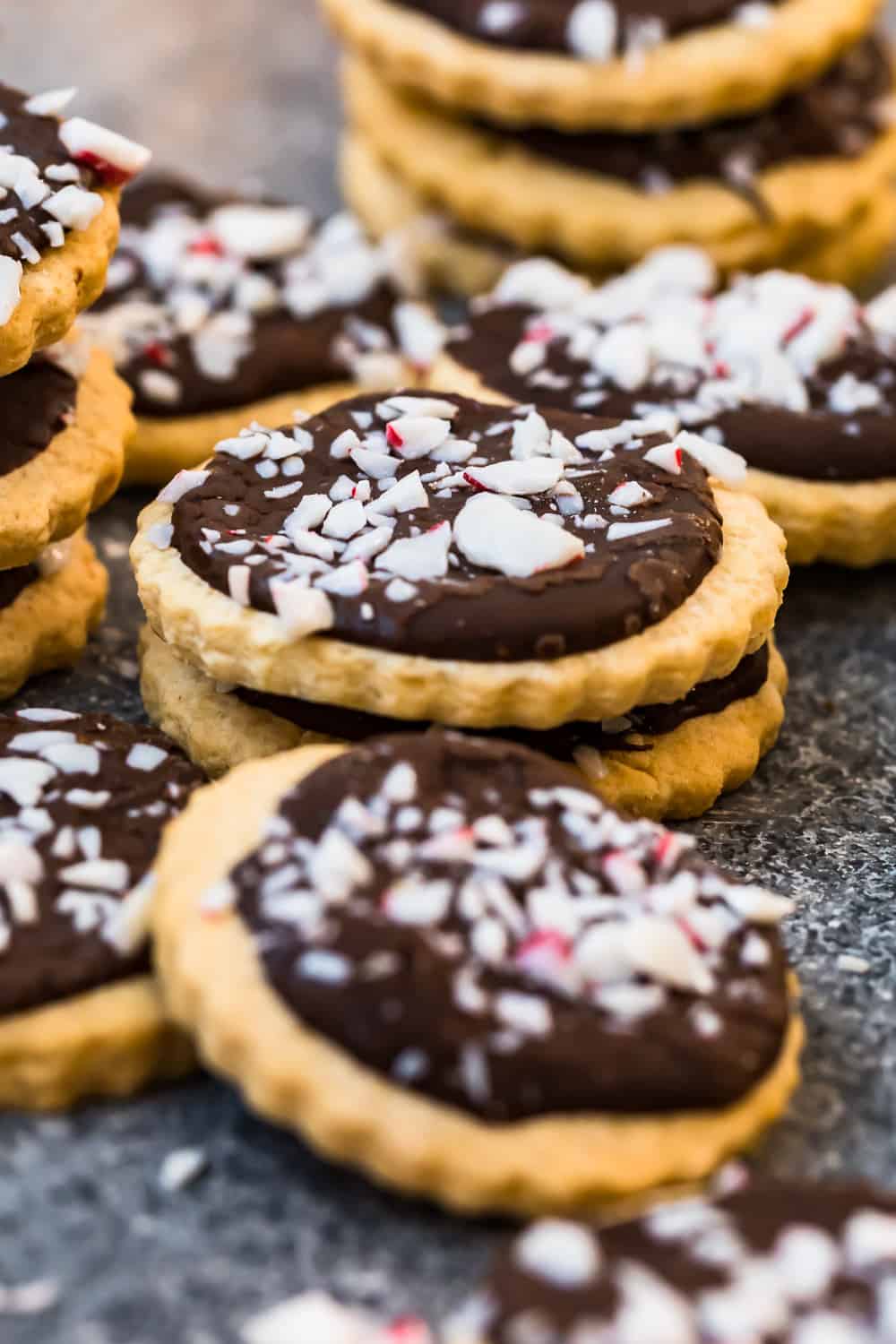 a stack of milano cookies with sprinkles on top.