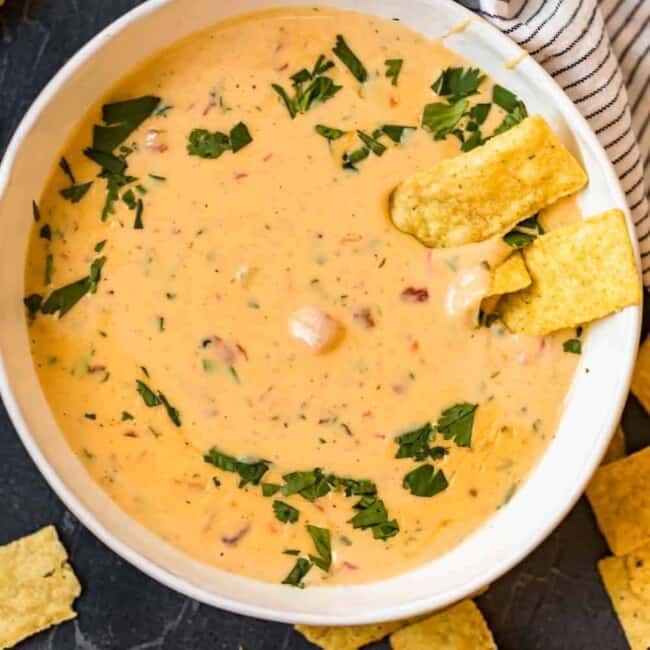 queso cheese dip in a bowl with chips