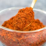 homemade chili seasoning being scooped up with a spoon