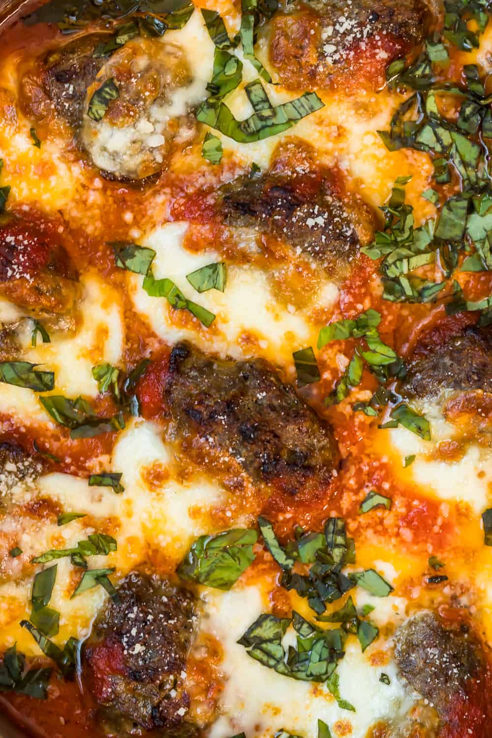close up of cheese and meatballs