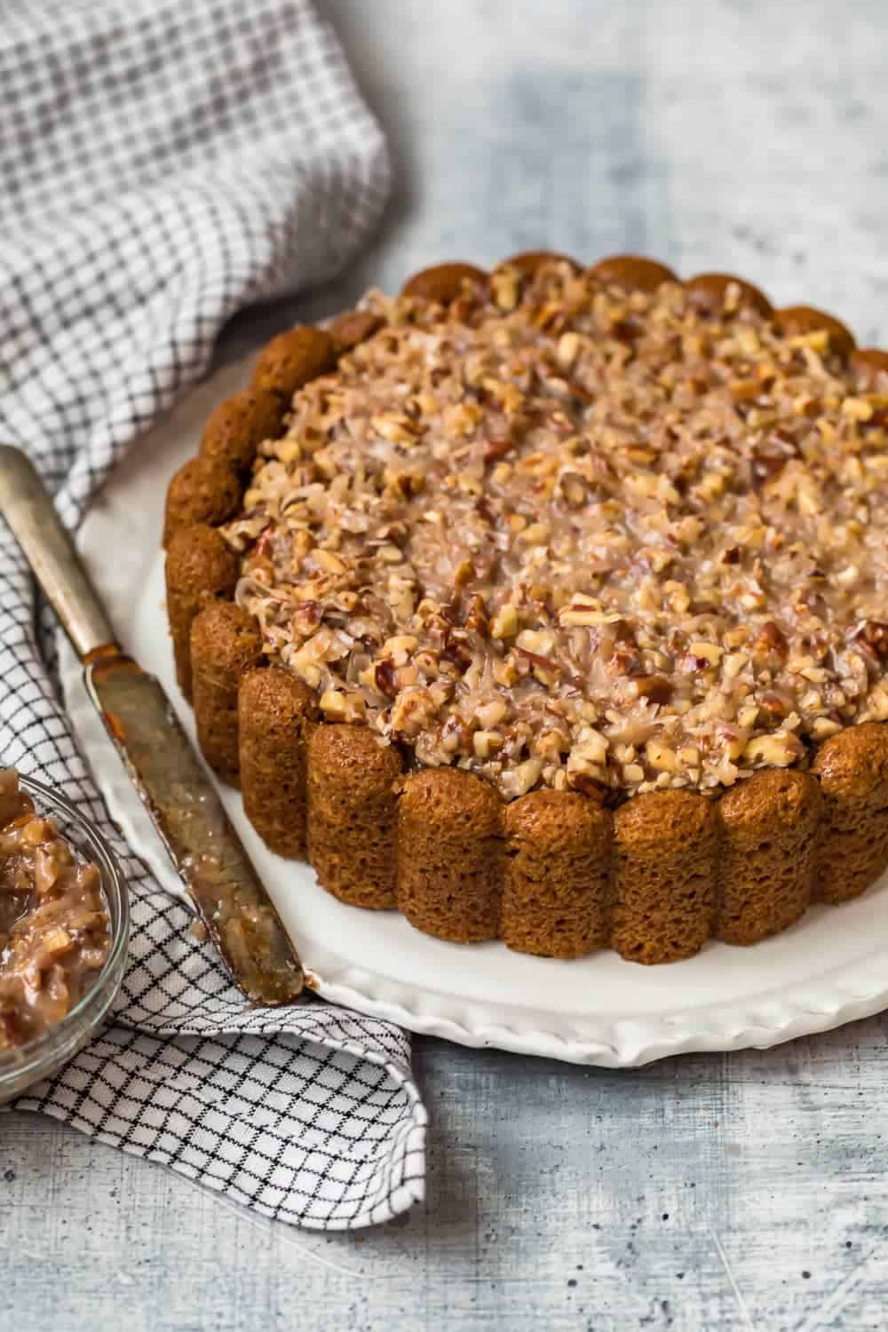 An Old Fashioned Oatmeal Cake on a white plate