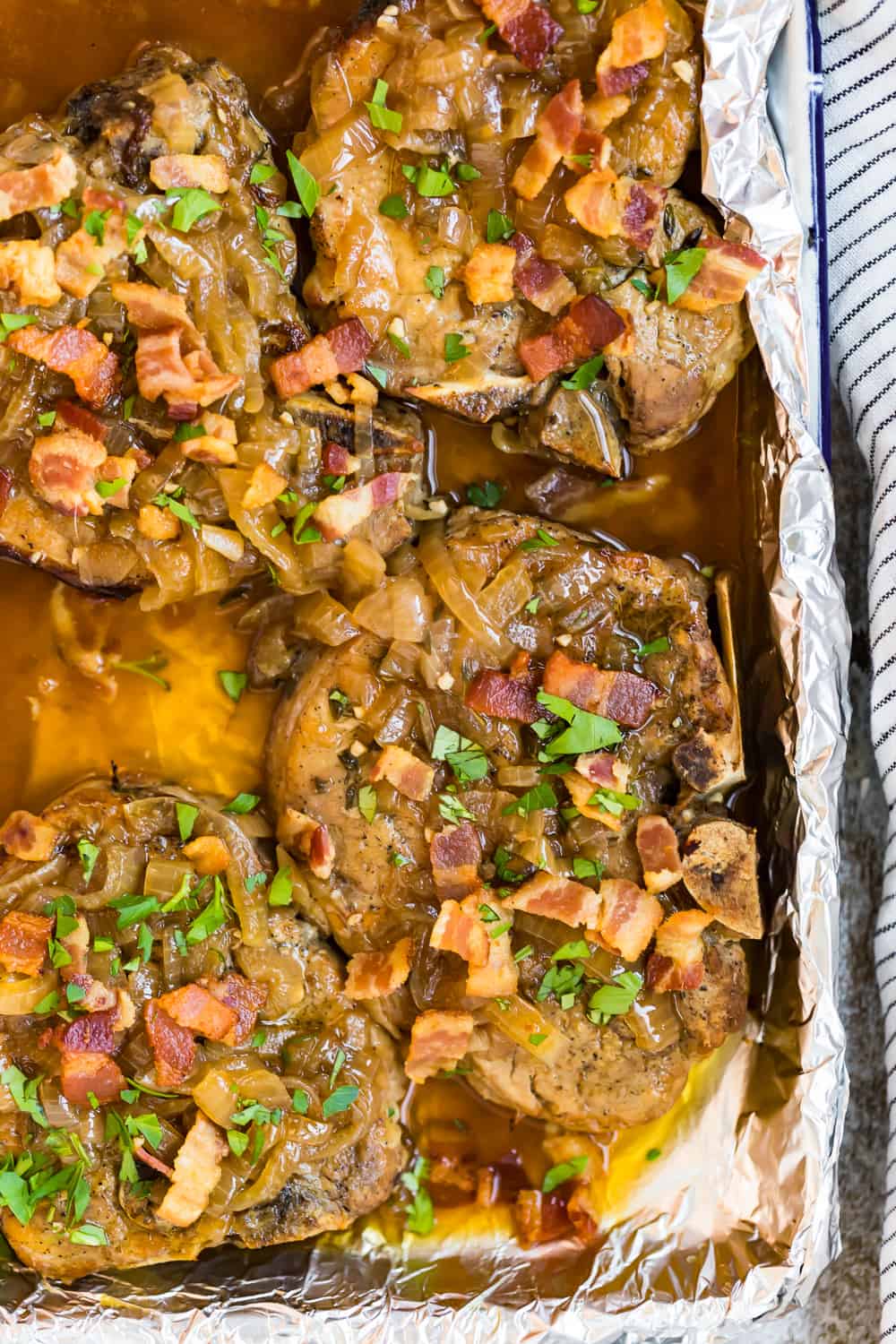 top down shot of crock pot smothered pork chops