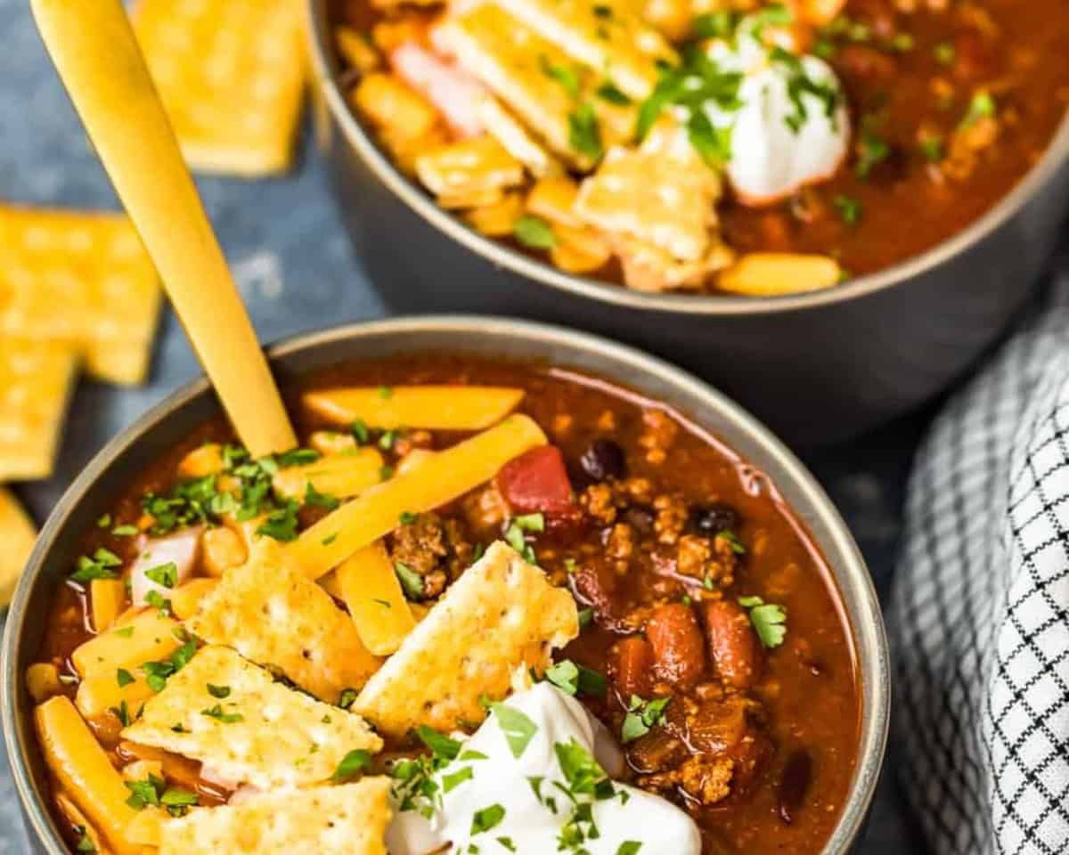 Two bowls of crockpot chili. 