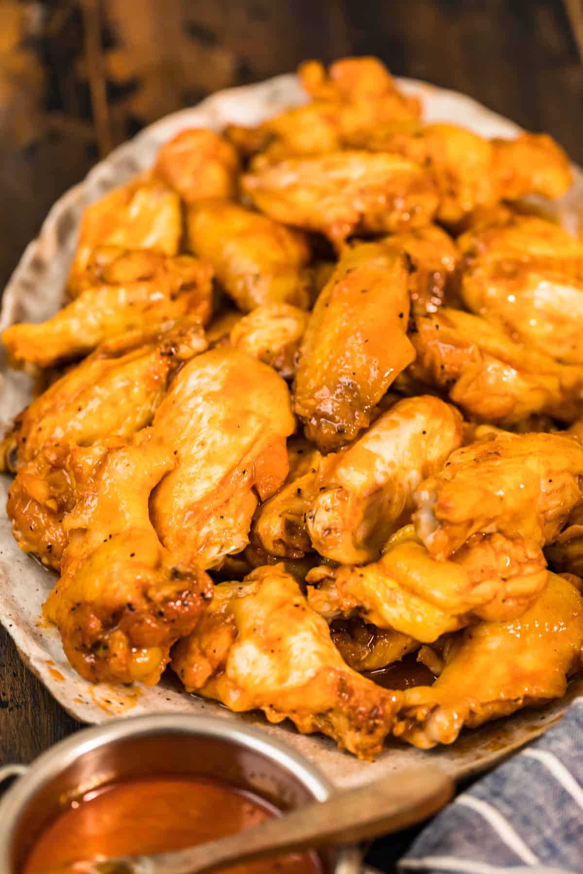 a plate of honey bbq chicken wings