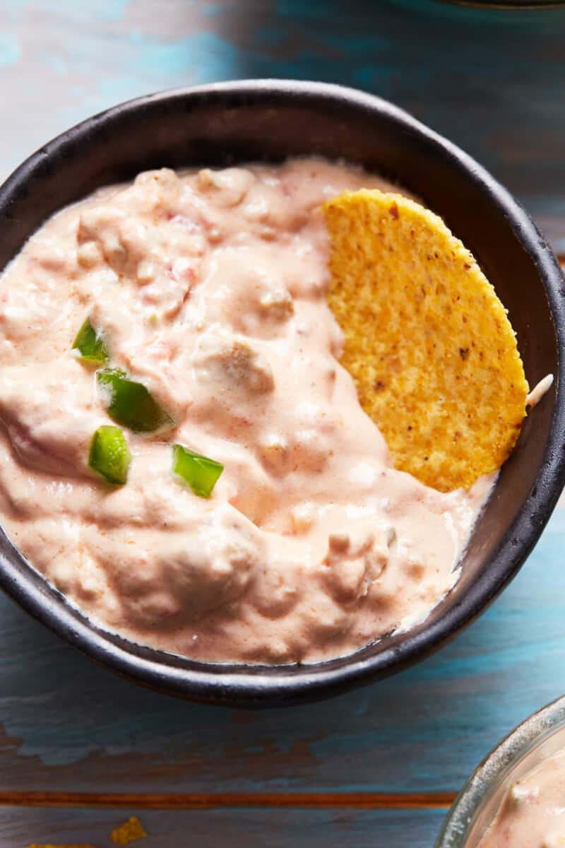 crockpot sausage cream cheese dip in black bowl