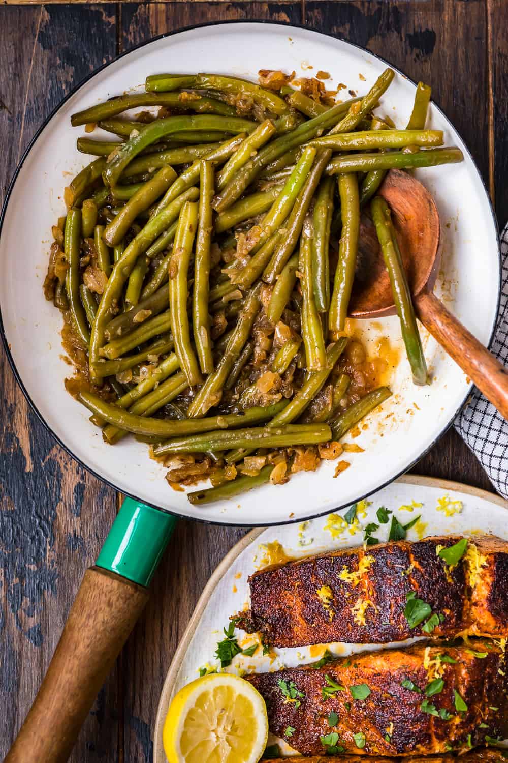 spoon in bowl of green beans and bacon