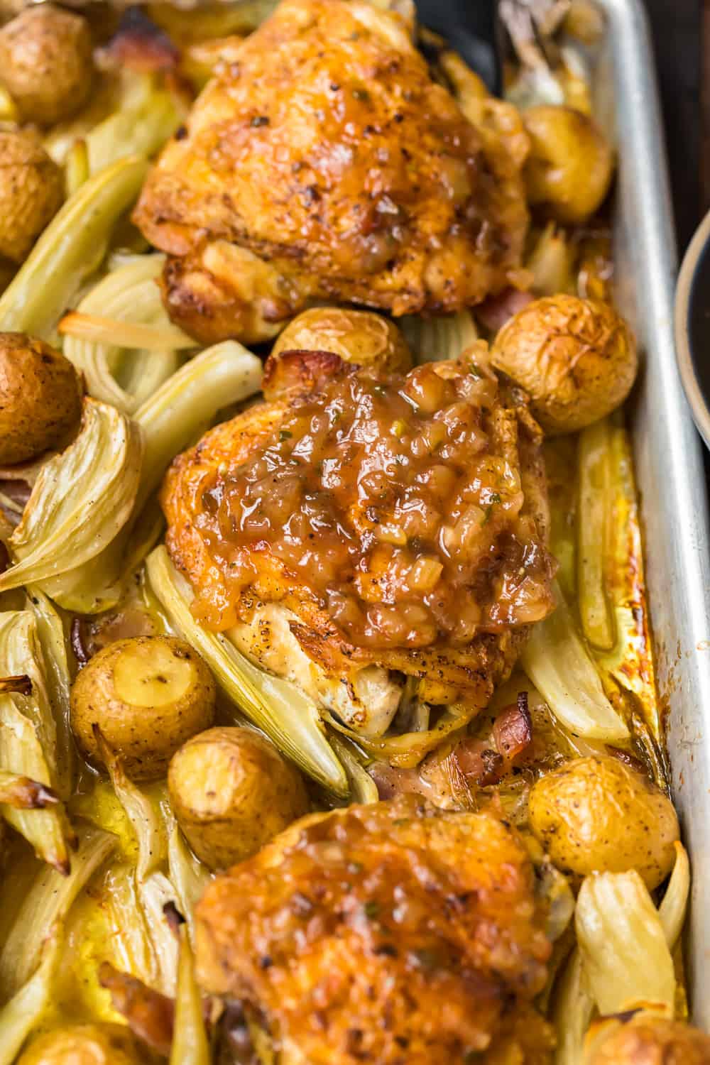 roast chicken and potatoes in a pan