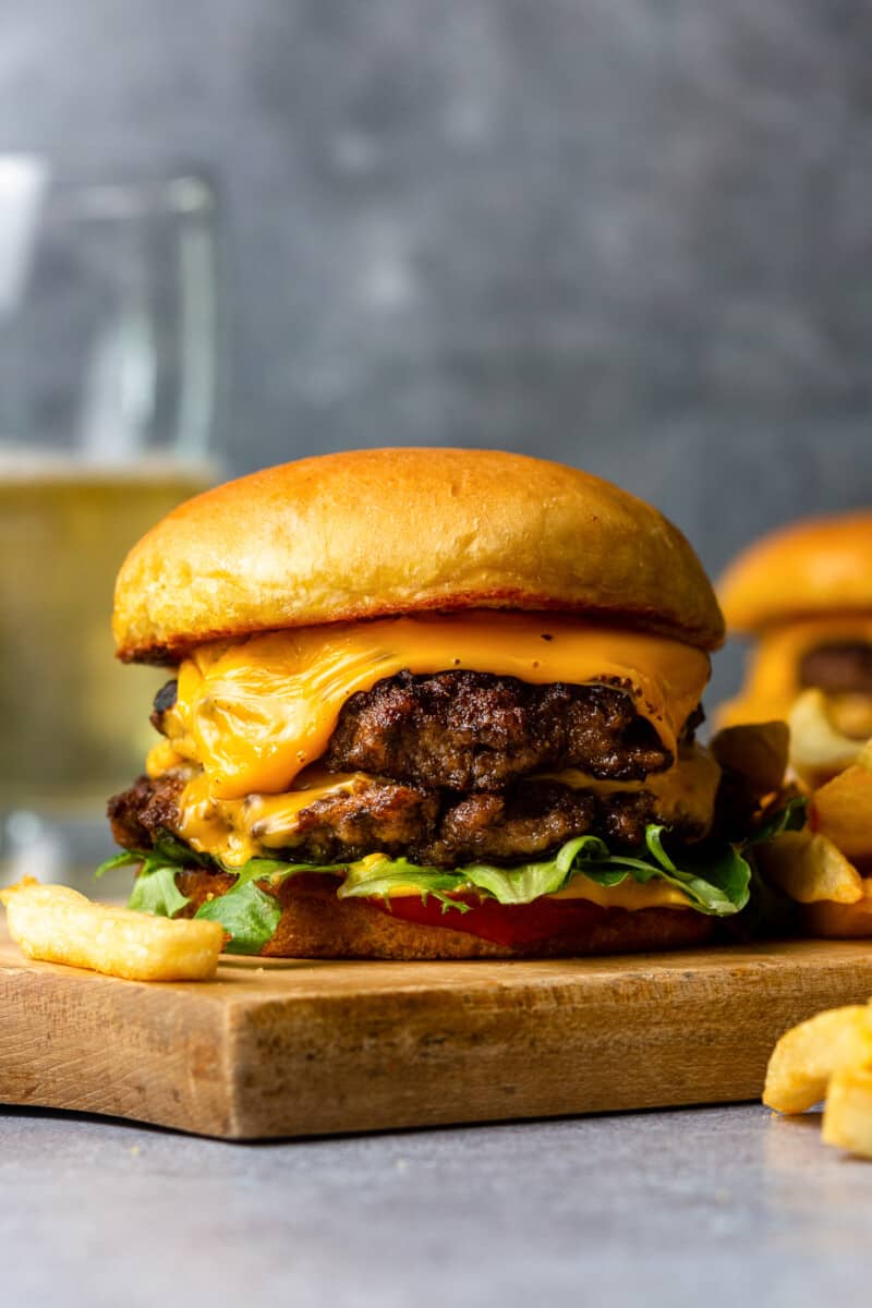 smash burger on cutting board