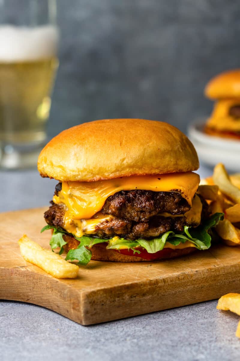 smash burger on cutting board