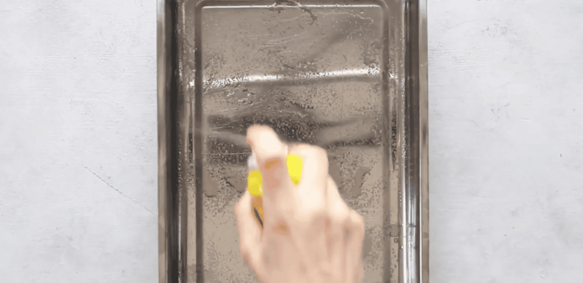 spraying baking dish