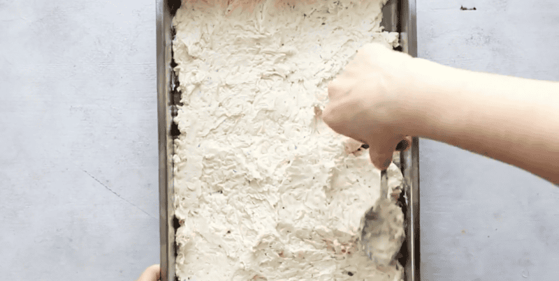 spreading the cheese mixture into a baking pan