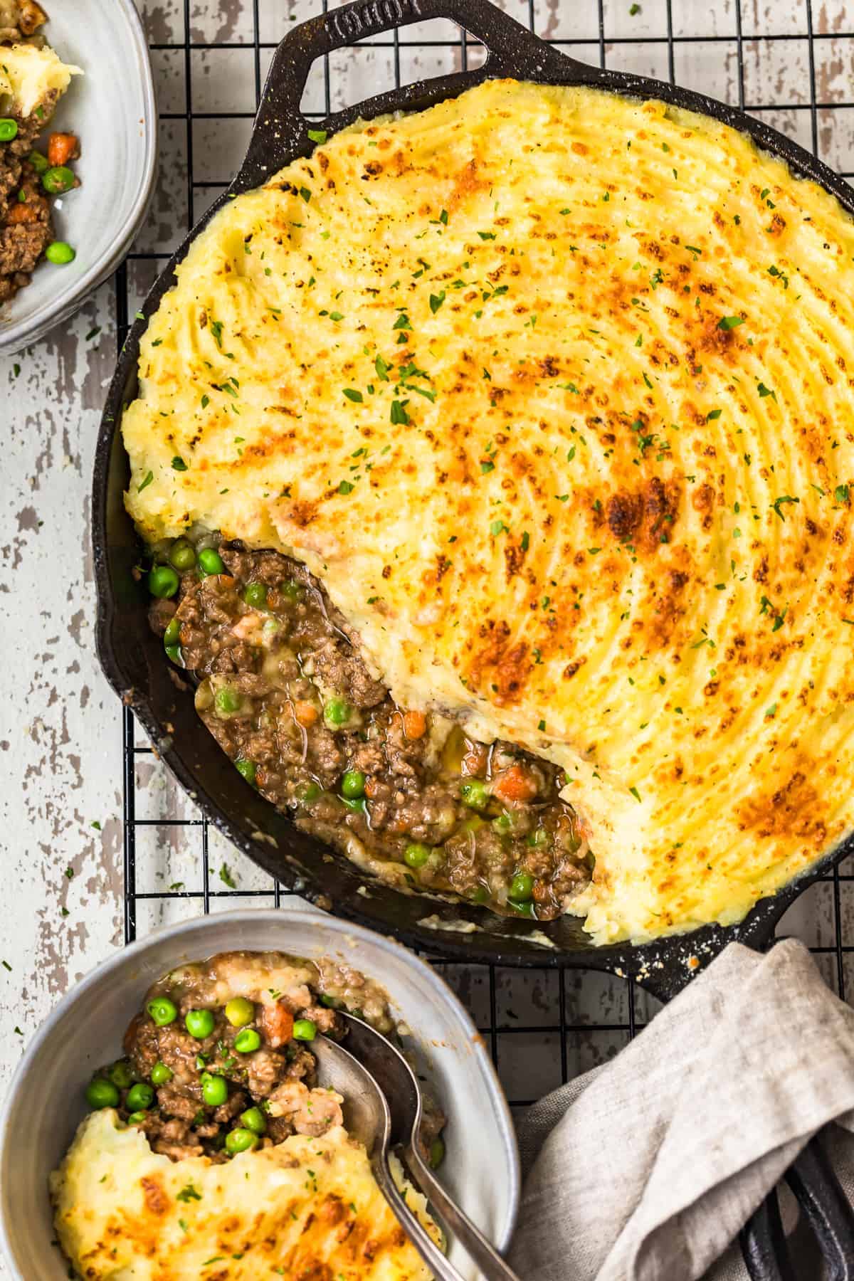 skillet with ground beef and potato topping