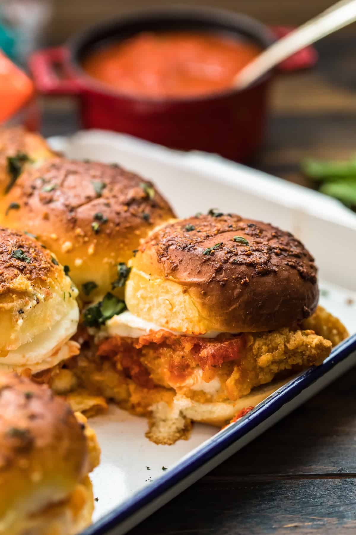 close up of chicken parmesan sliders