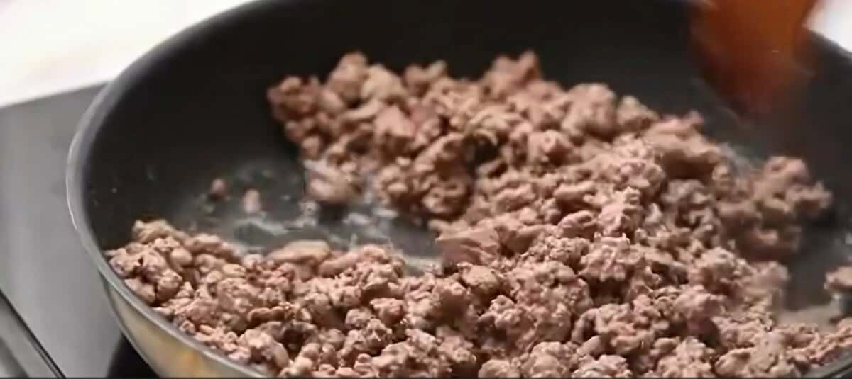 Browning ground beef.