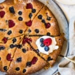 berry muffin coffee cake with whip cream on top