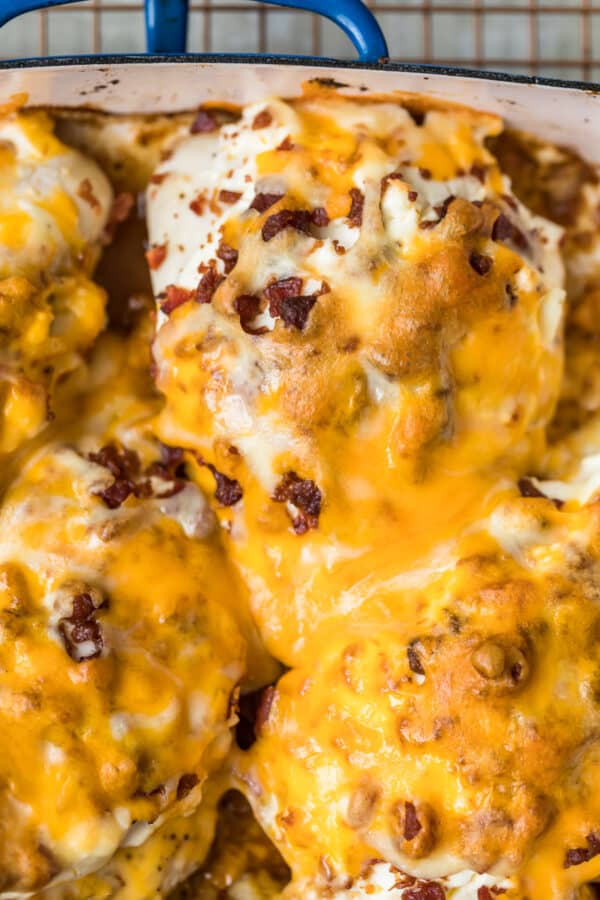 Melted cheese on top of the Bacon Crusted Chicken 