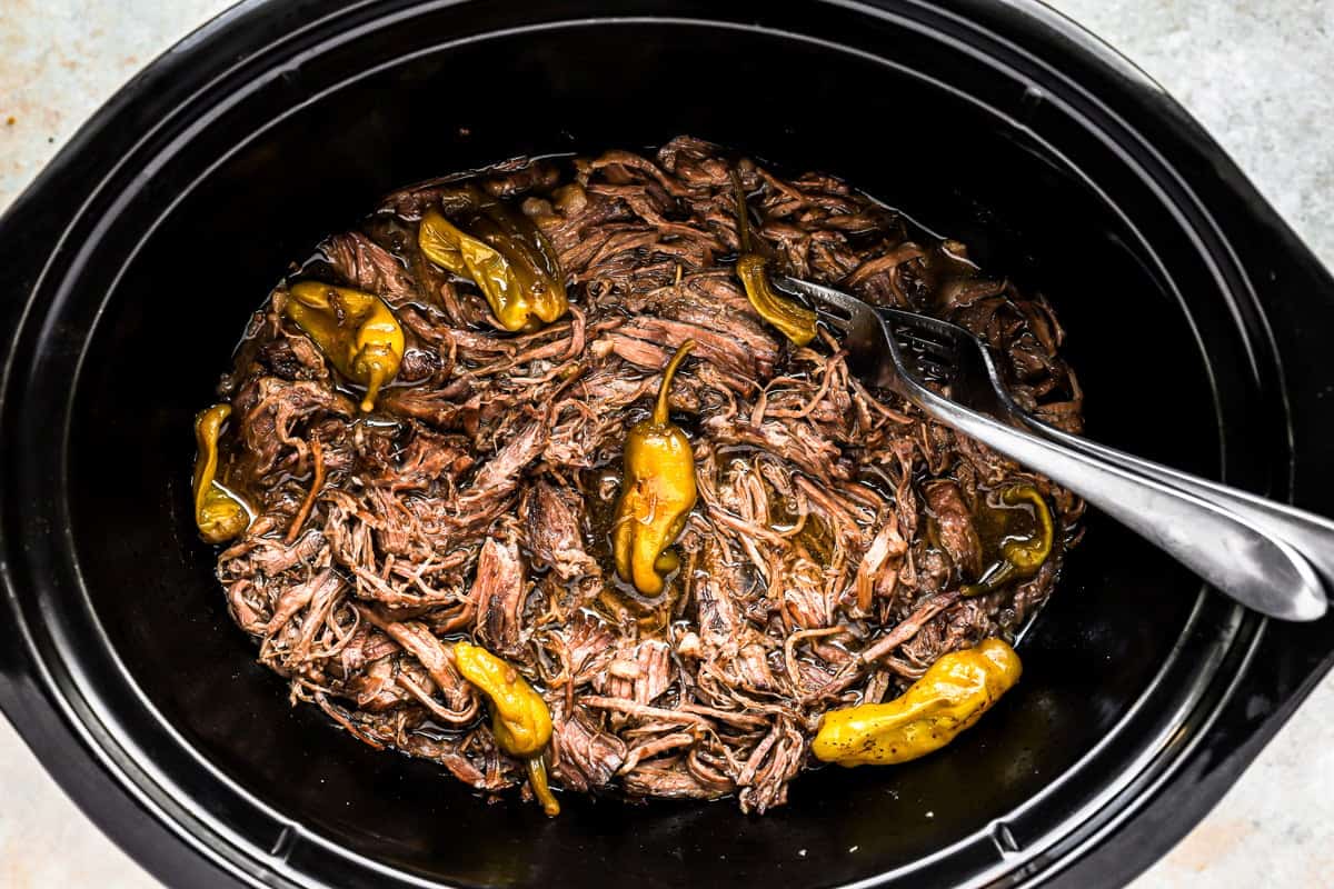 A Mississippi pot roast cooked in a crock pot.