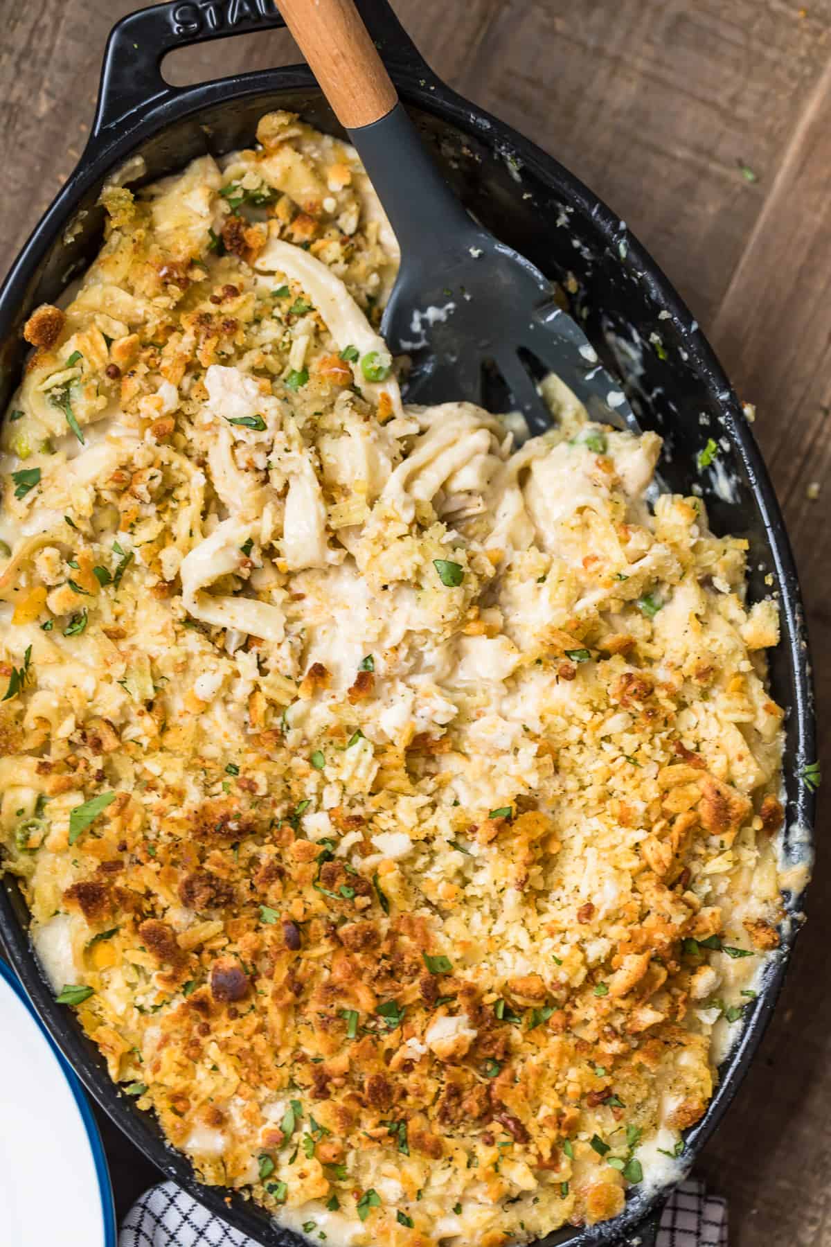 Tuna Noodle Casserole in a baking dish with a spoon