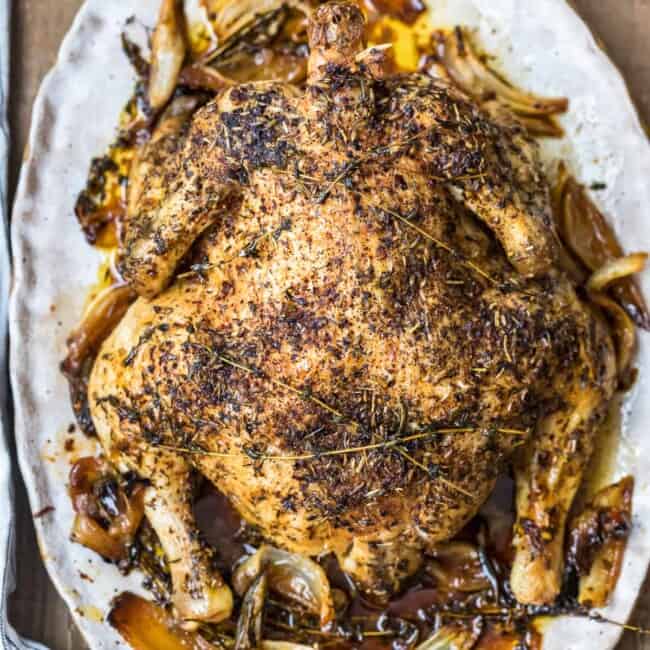whole roasted chicken with herbs de provence on platter