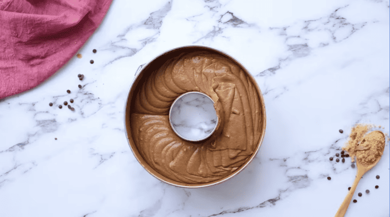 chocolate cake batter in a bundt pan.