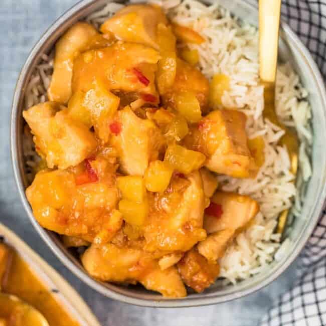 sweet and sour chicken in a bowl with rice