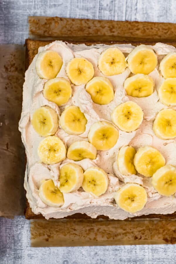 overhead picture of banana cake on parchment