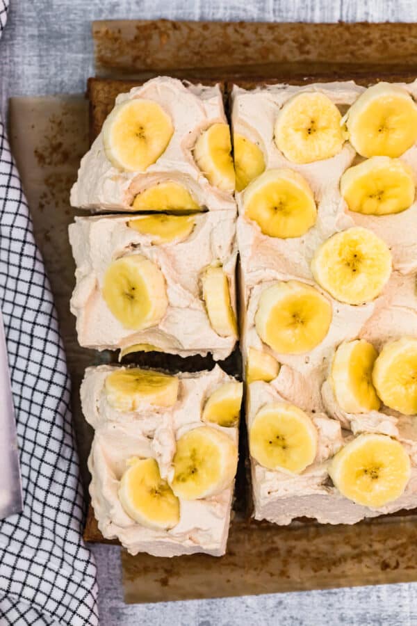sliced banana cake garnished with bananas