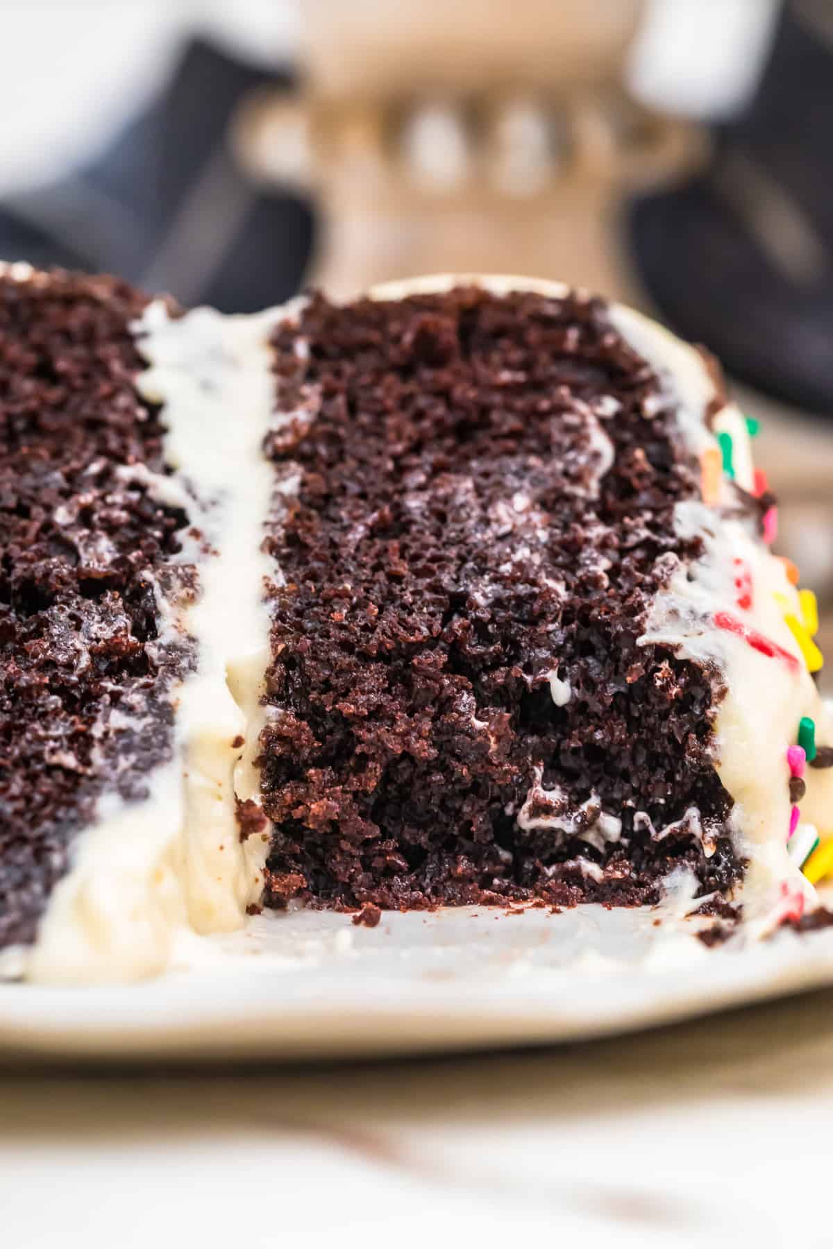 slice of black magic chocolate cake on plate