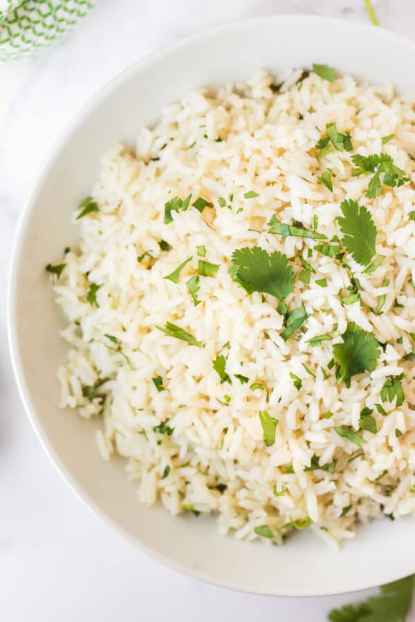 up close image of rice with cilantro