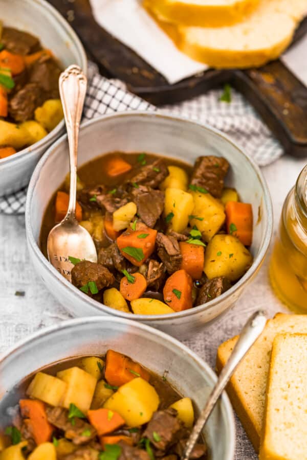 bowls of stew with beer bread