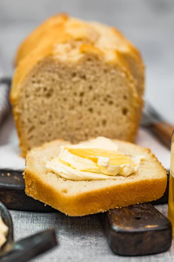 butter on slice of loaf