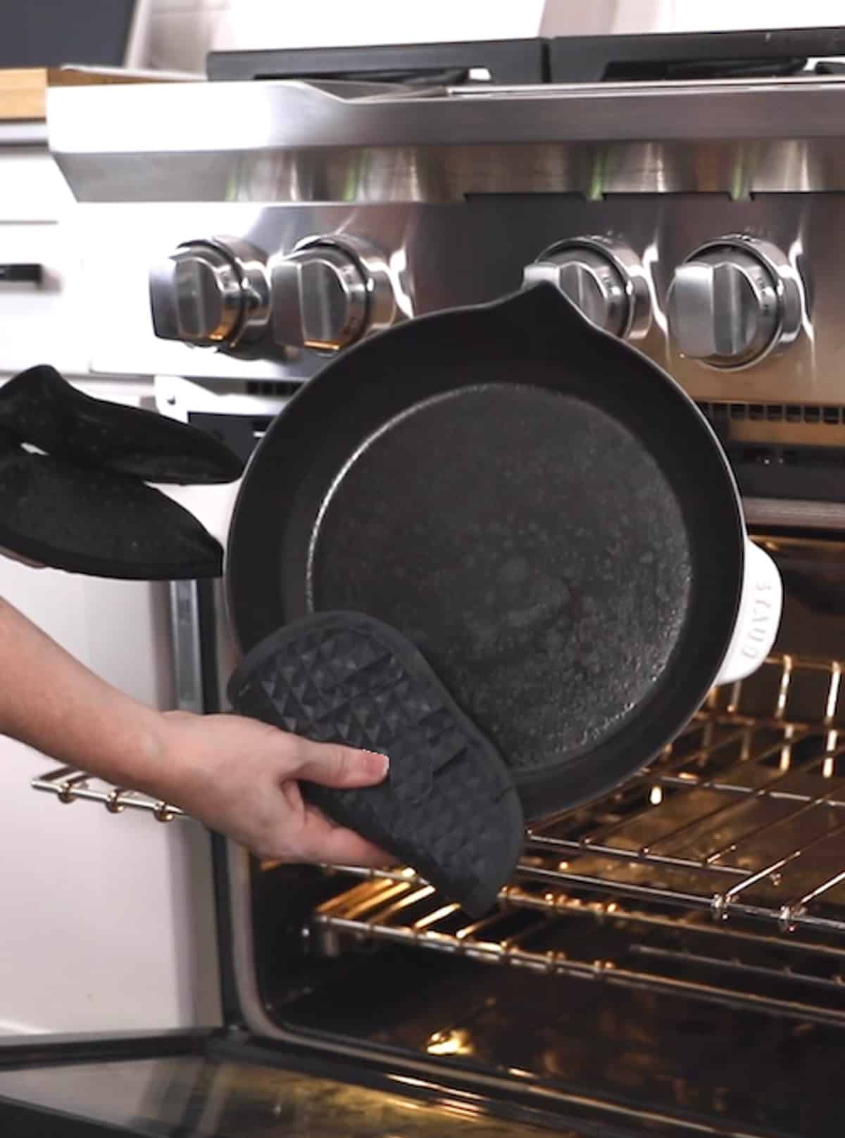 taking cast iron skillet out of oven after seasoning