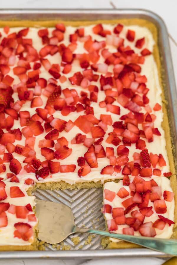 strawberry lemonade sugar cookie bars on sheet pan