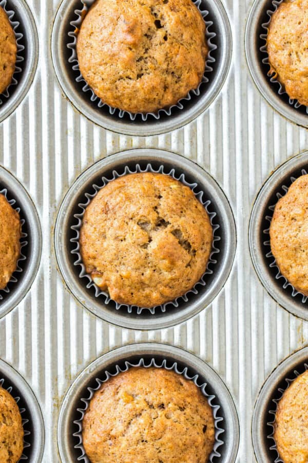 overhead image of banana muffins in muffin tin