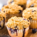 blueberry muffins on cutting board