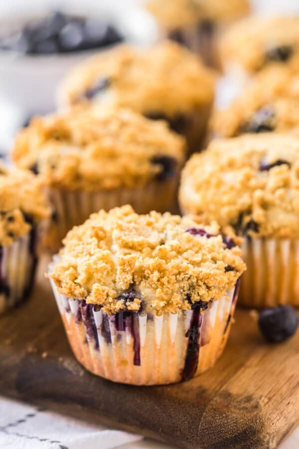 blueberry muffins on cutting board