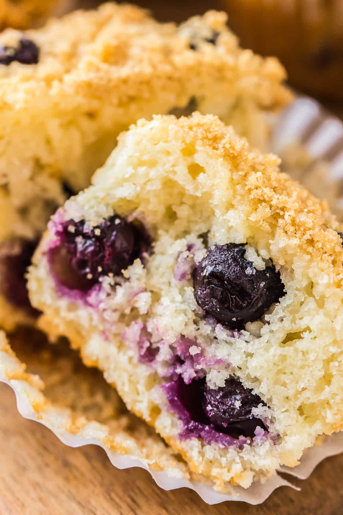 up close image of blueberry muffin cut in half