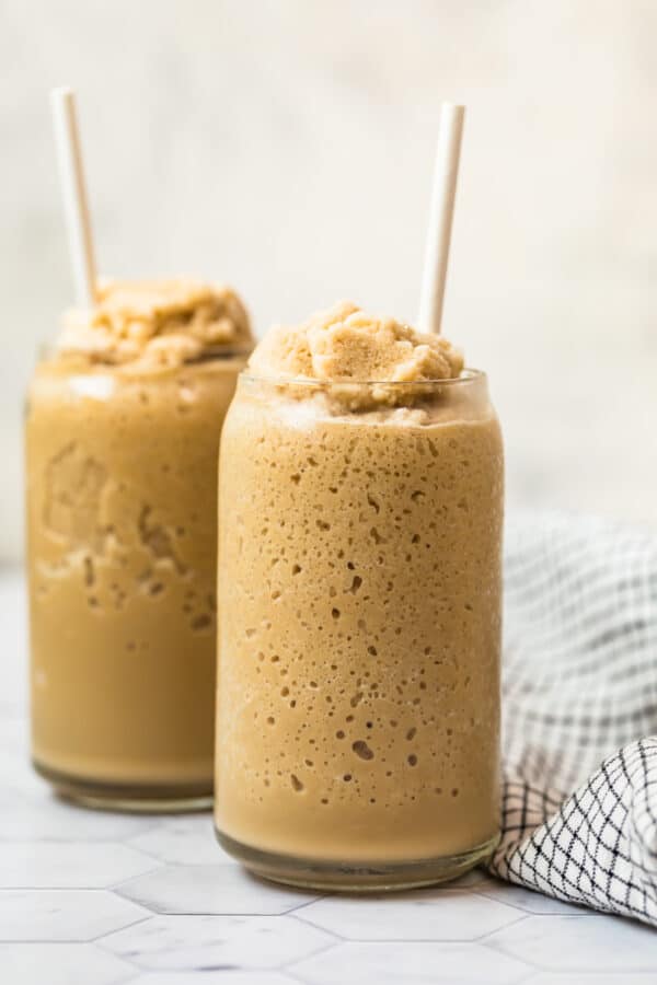 keto coffee smoothie in two glasses with straws