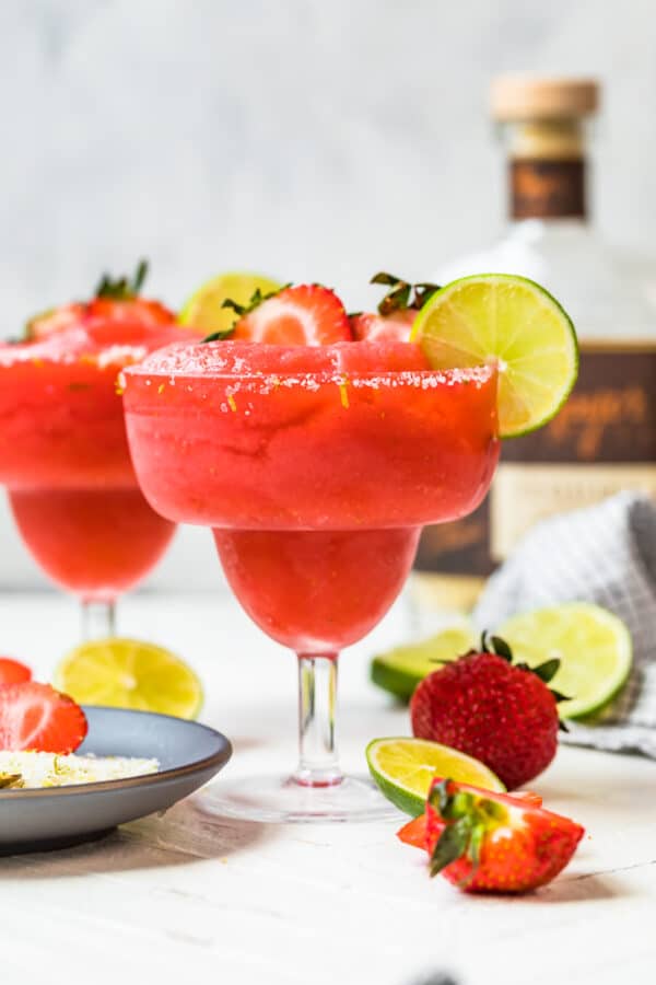 two strawberry margaritas in glasses