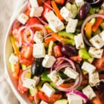 up close image of greek salad in bowl